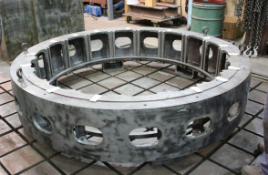 Cleaned and prepped hydro generator stator housing without laminations