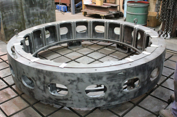 Cleaned and prepped hydro generator stator housing without laminations